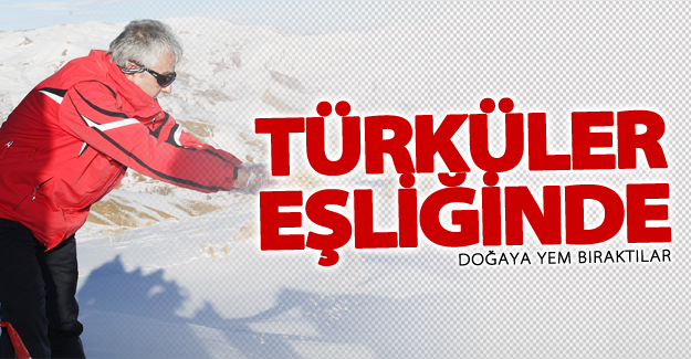 Türküler eşliğinde doğaya yem bıraktılar