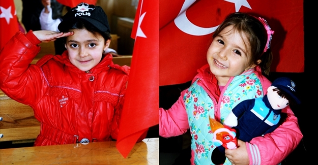 Polisten öğrencilere giyim yardımı