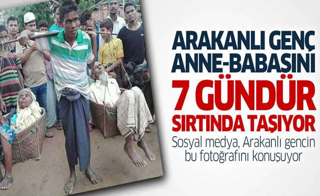 Arakanlı genç anne ve babasını 7 gündür sırtında taşıyor