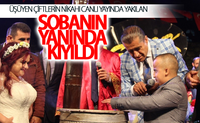 Üşüyen çiftlerin nikahı canlı yayında yakılan sobanın yanında kıyıldı