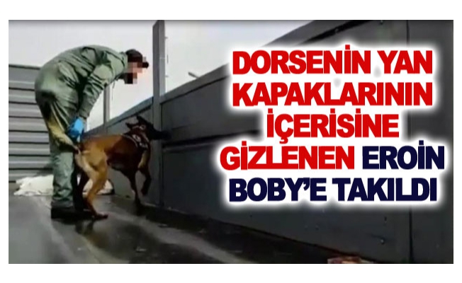 Dorsenin yan kapaklarının içerisine gizlenen eroin Boby’e takıldı